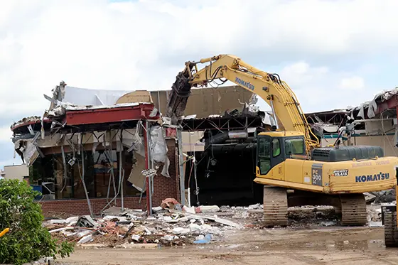 tearing down a building