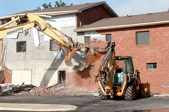 bricks falling off a building