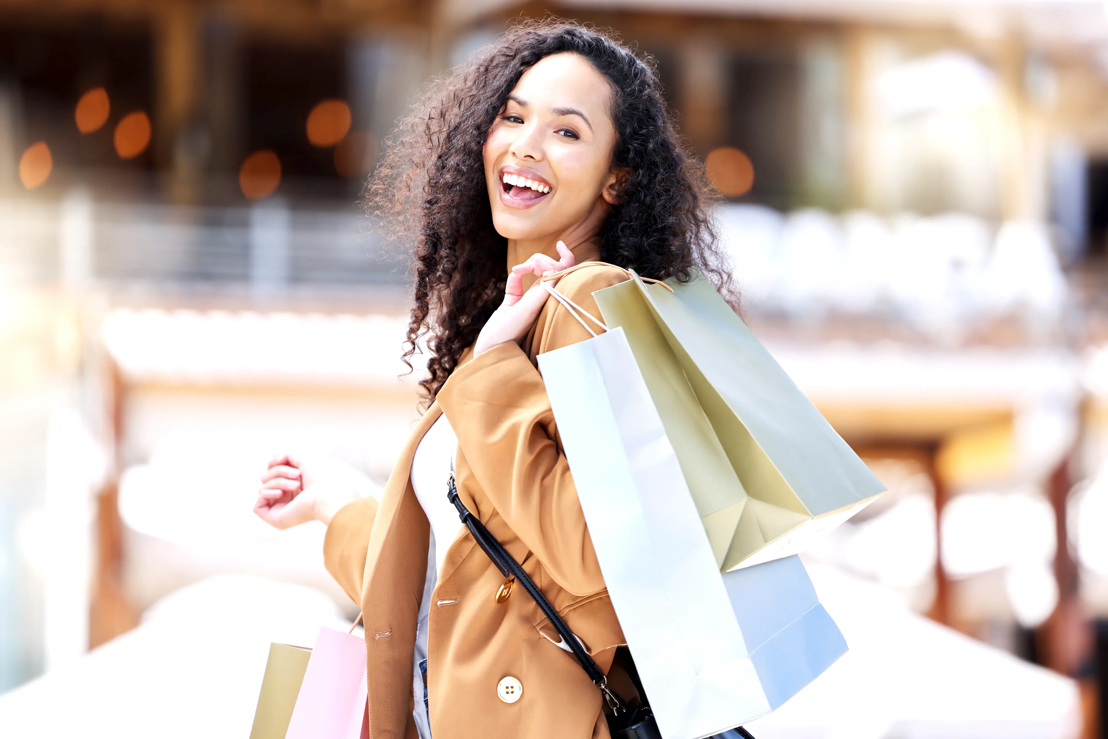 woman holding shopping bags