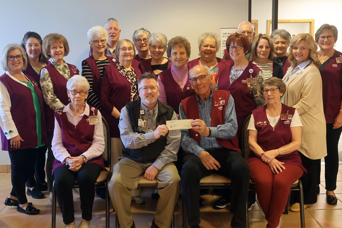 CMH Auxiliary members presenting the check to CMH Home Medical Equipment